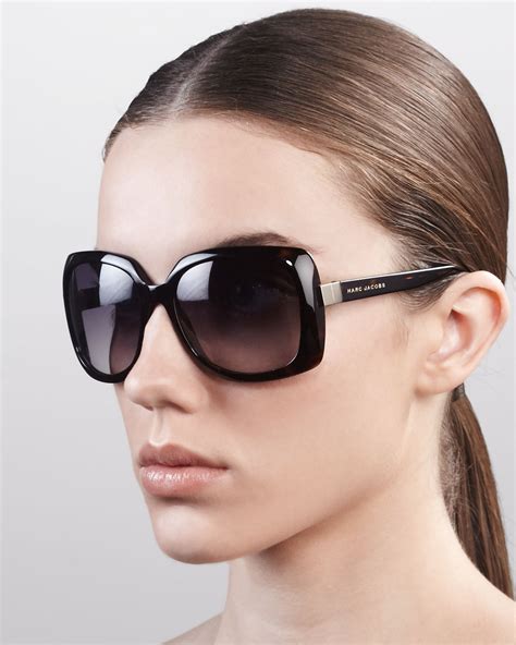 MARC JACOBS glasses and sunglasses .